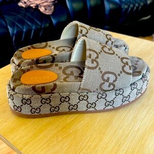 Gucci platforms slides